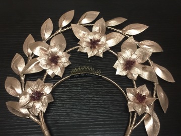 For Rent: Rose gold and maroon crown